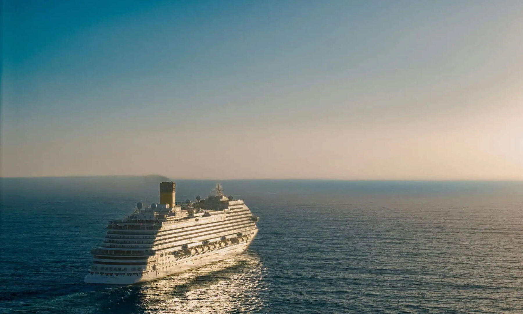 Cruise ship, illustrating concerns around infectious disease monitoring and public health vigilance during international travel