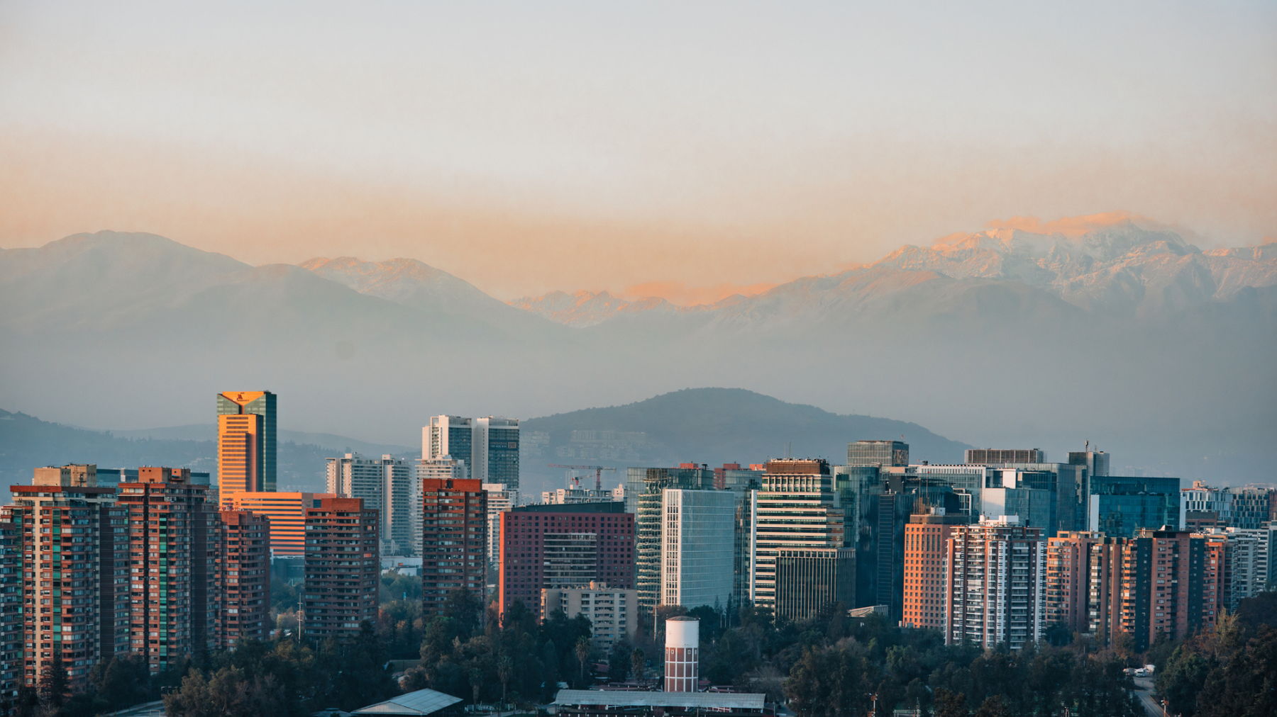 image of Santiago, Chile city skyline with snowy mountains in the background