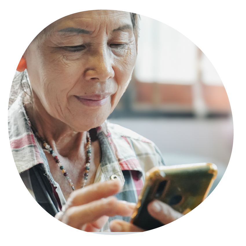 Image: An older person using a smartphone.