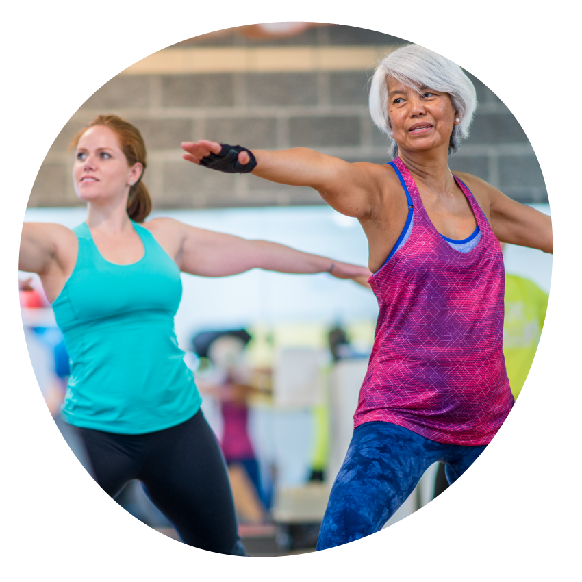 Email Image: Two people in workout clothes in stretch positions.