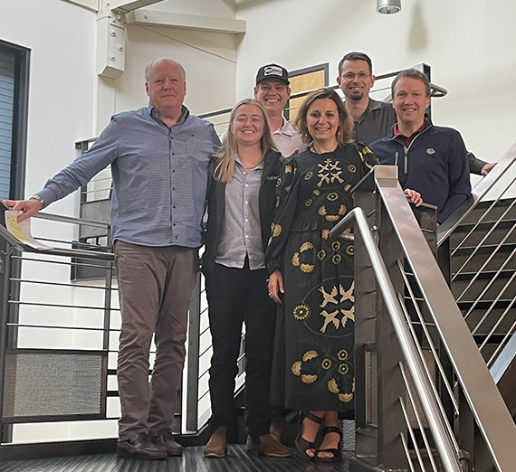 Dean Allen and Katia Passerini with Gonzaga grads working at McKinstry