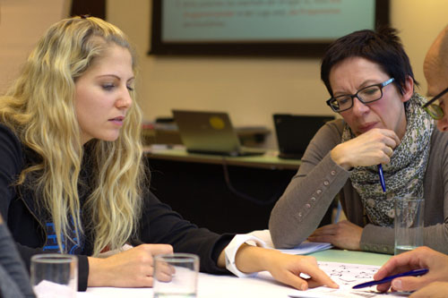 People discussing things in a meeting