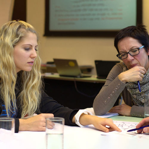 People discussing things in a meeting