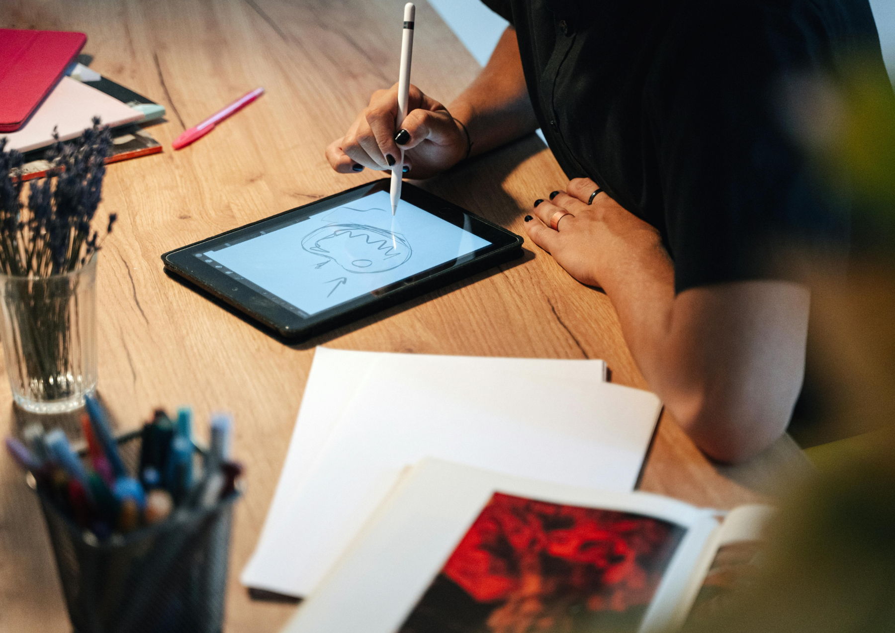 artist designing on ipad