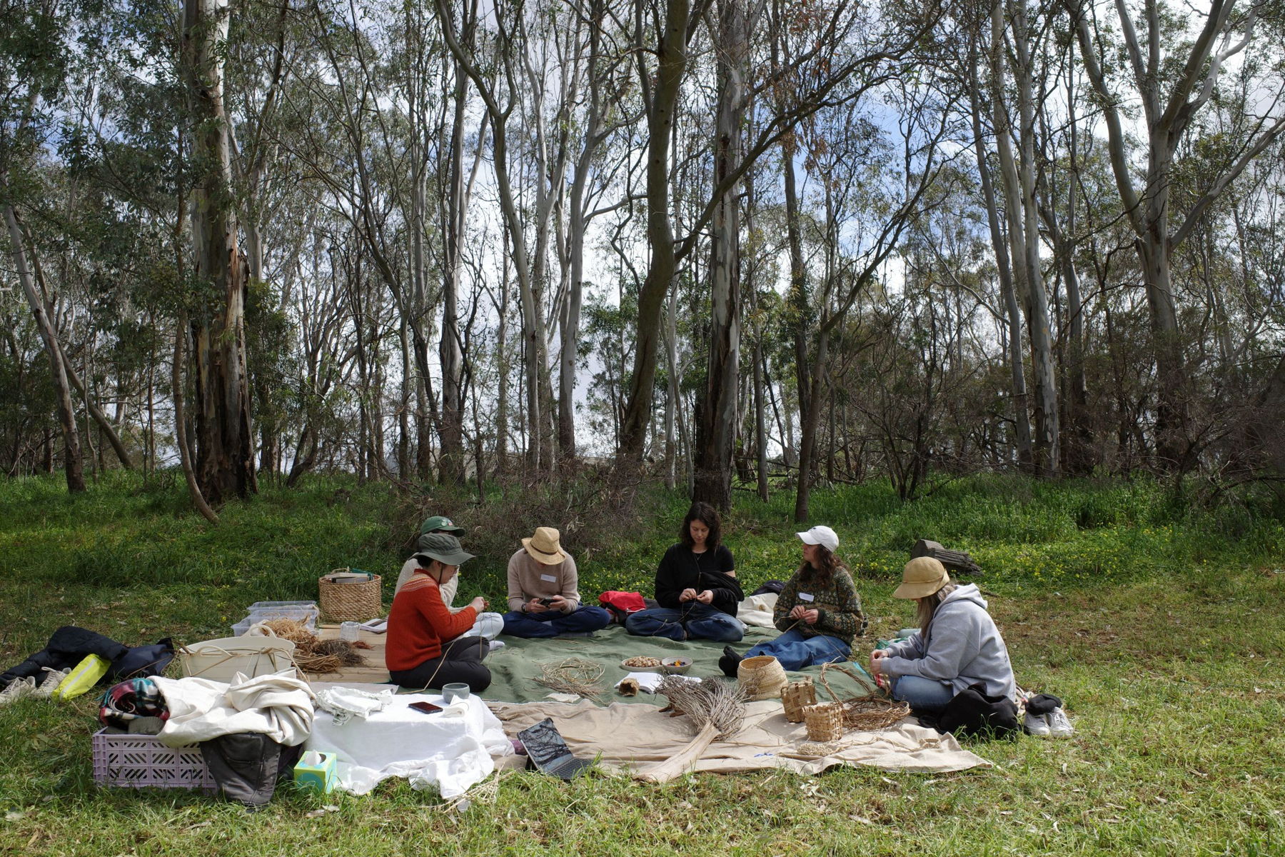 A group of people weaving in a circle