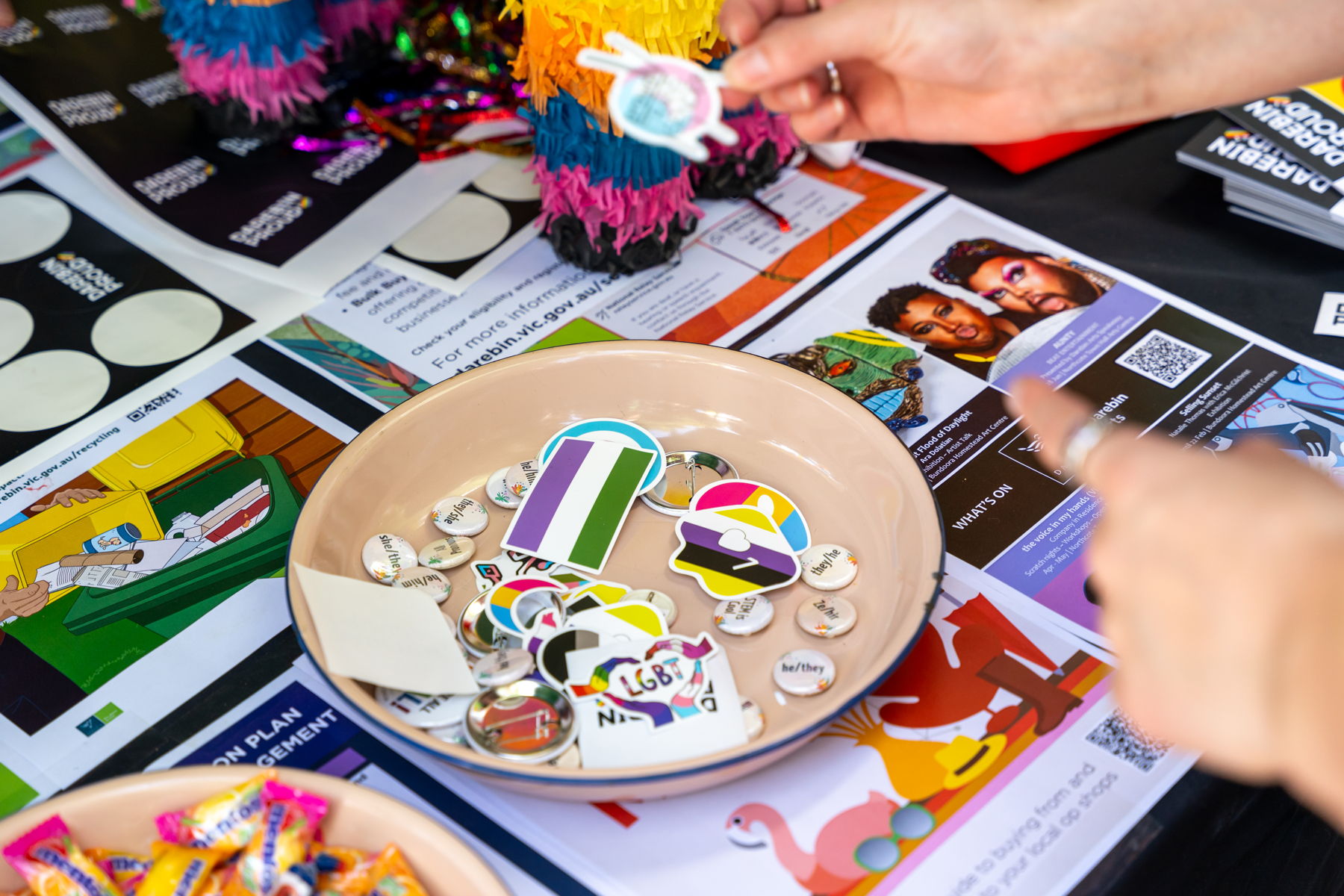 image from midsumma 2025 event featuring rainbow stickers
