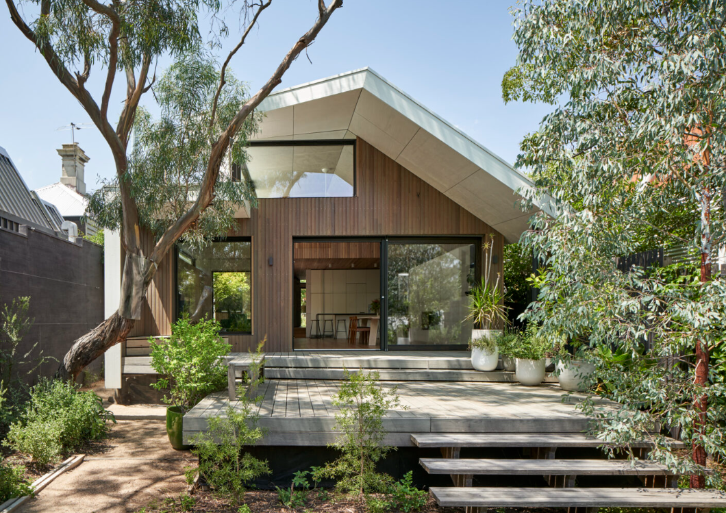 three people on a bike